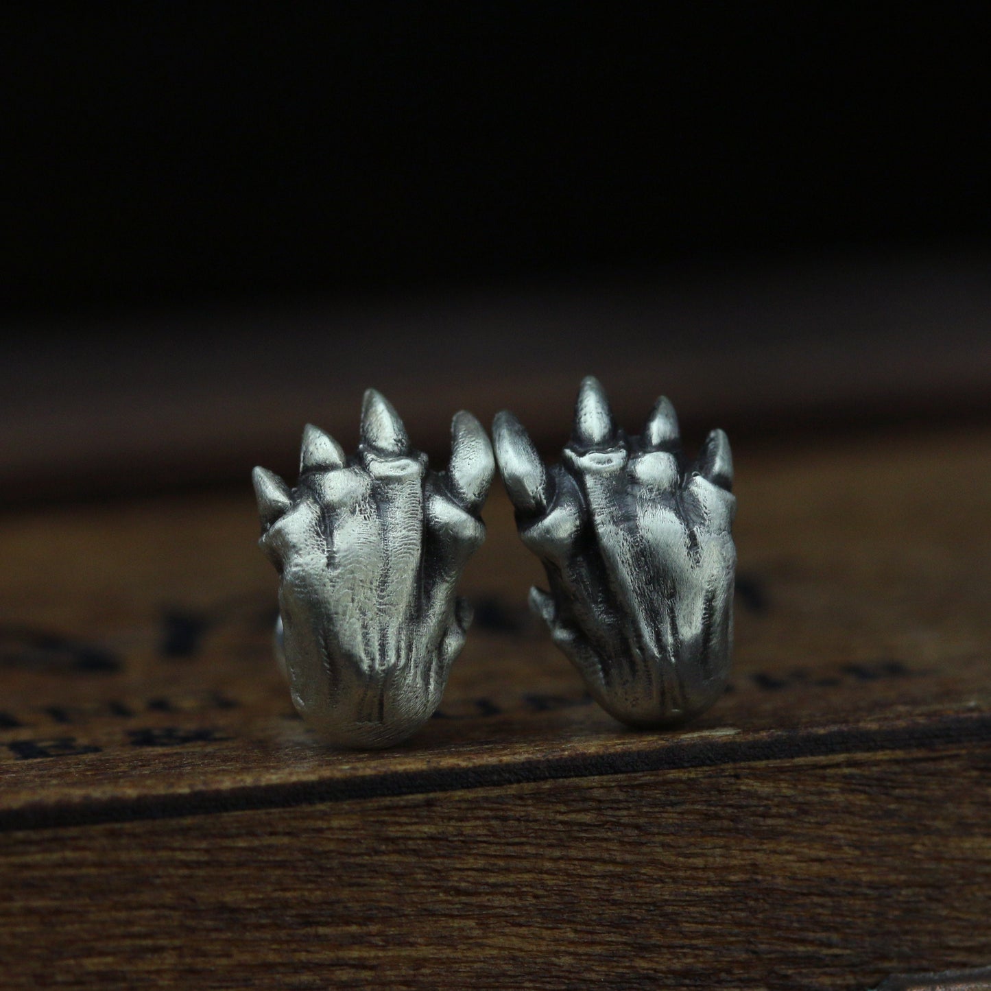 Saber-toothed tiger claw earrings