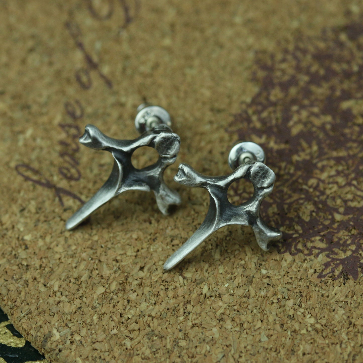 Spine cross earrings