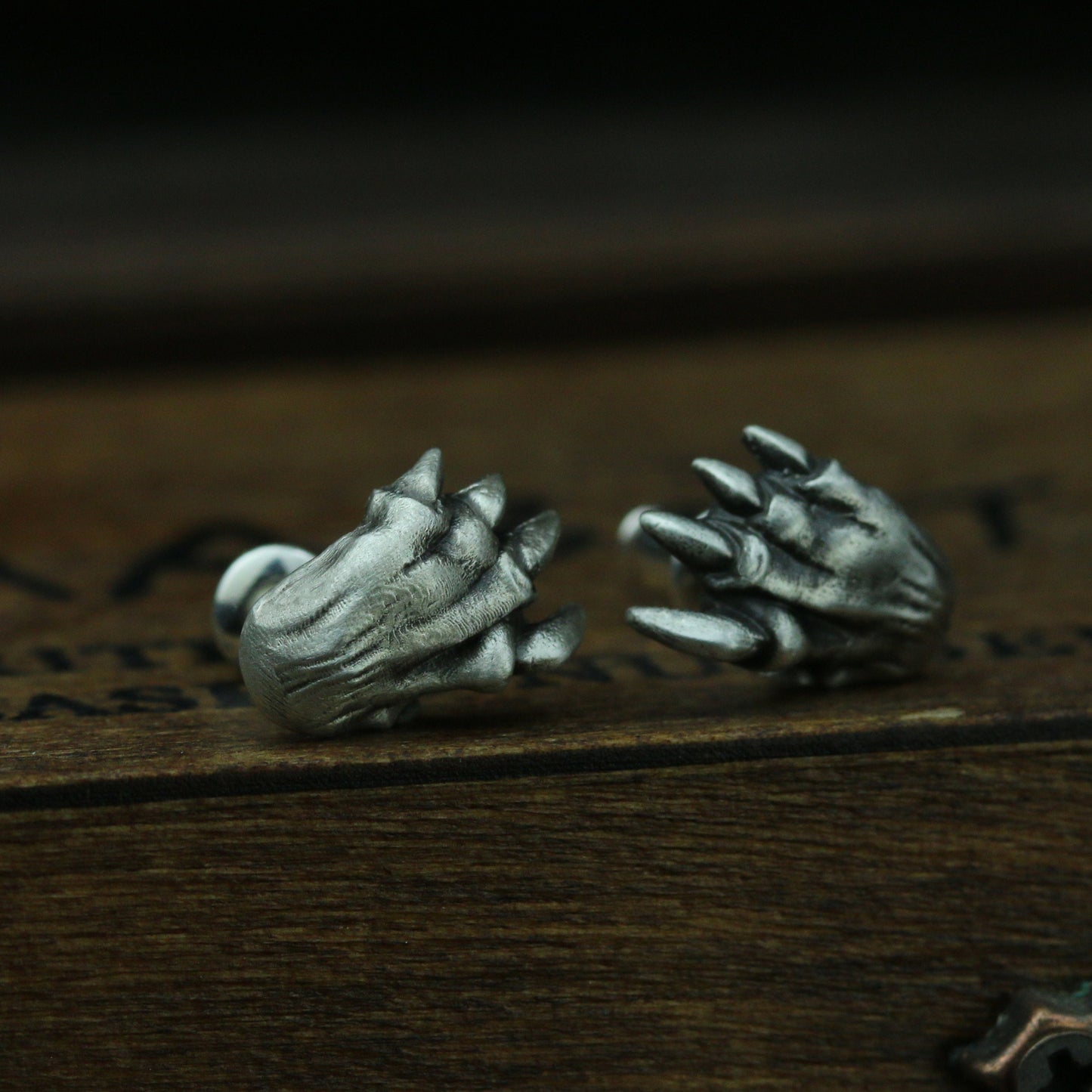 Saber-toothed tiger claw earrings