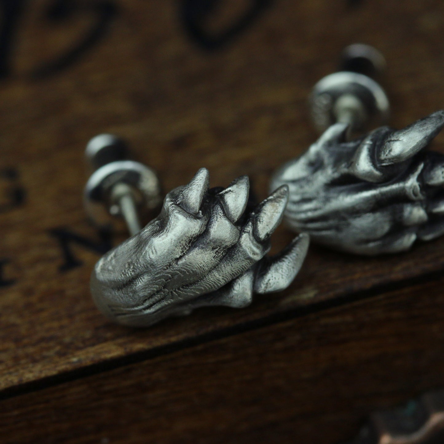 Saber-toothed tiger claw earrings