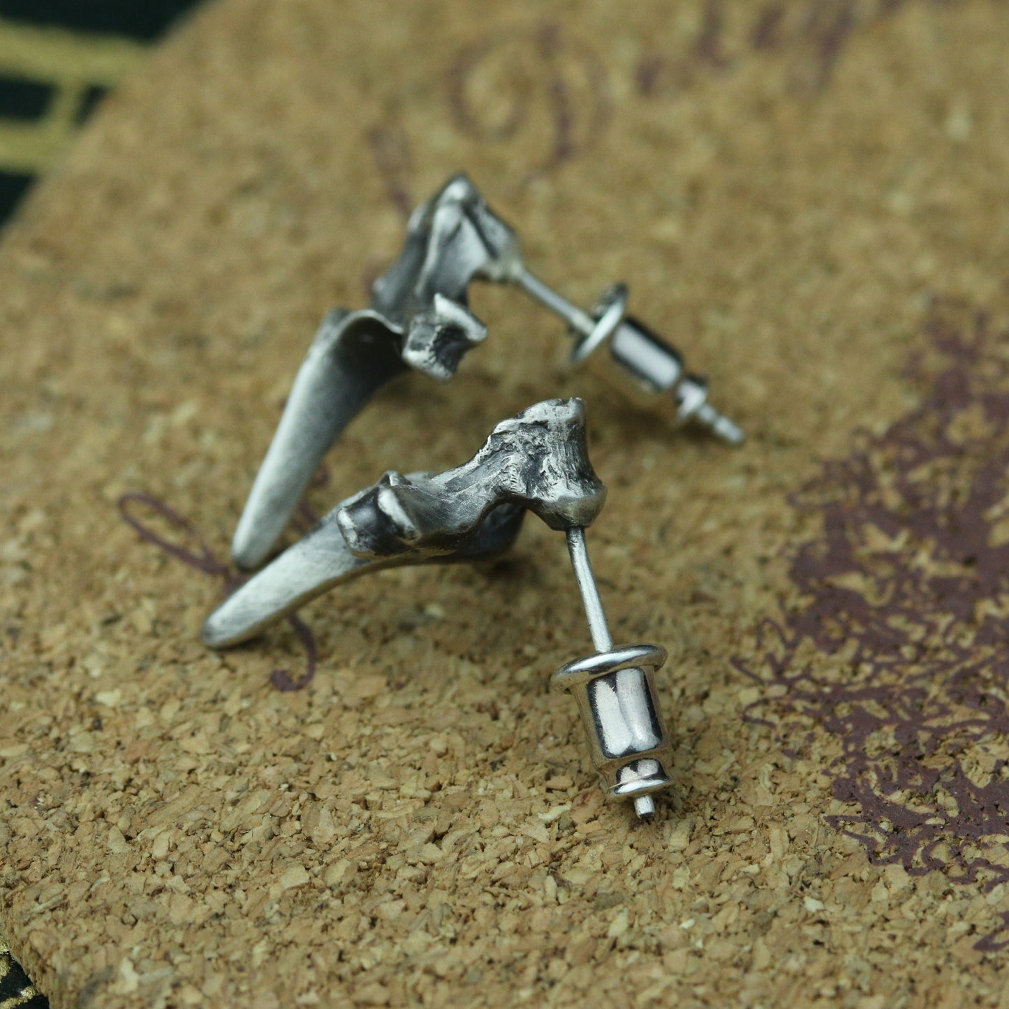 Spine cross earrings