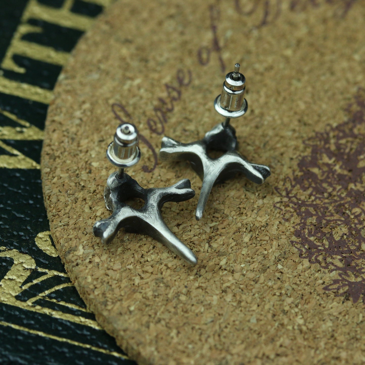 Spine cross earrings