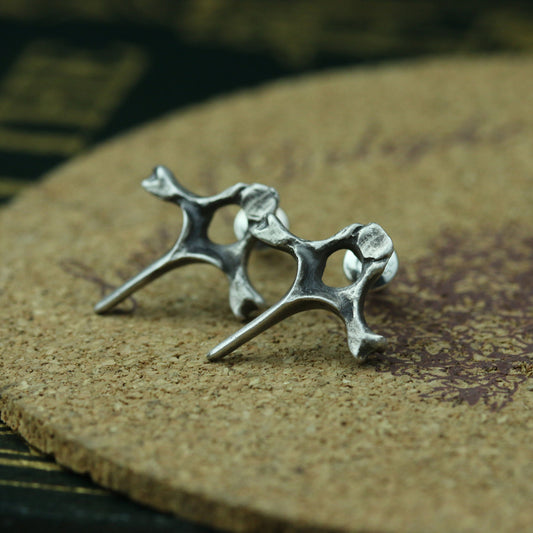 Spine cross earrings