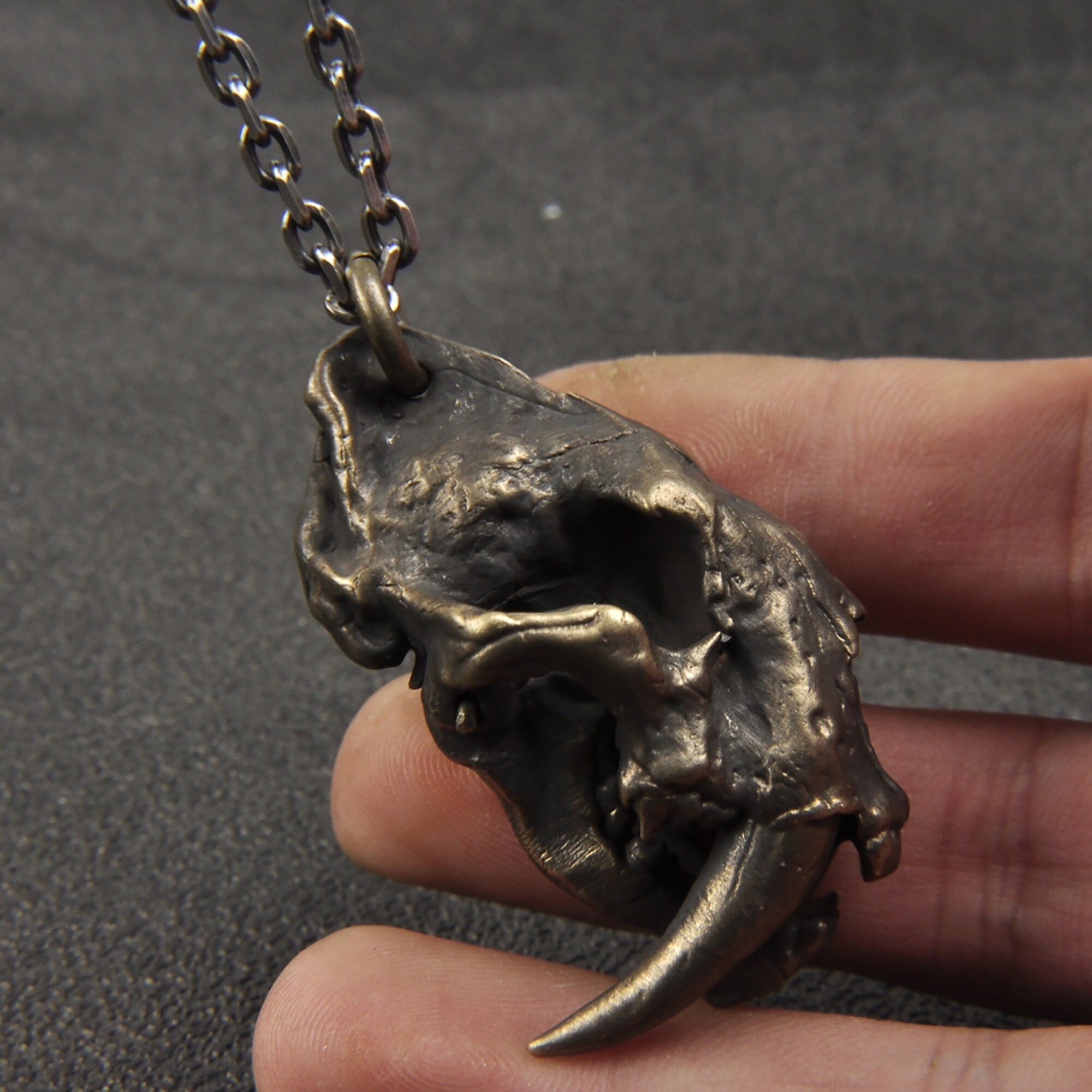 Saber tooth tiger on sale necklace