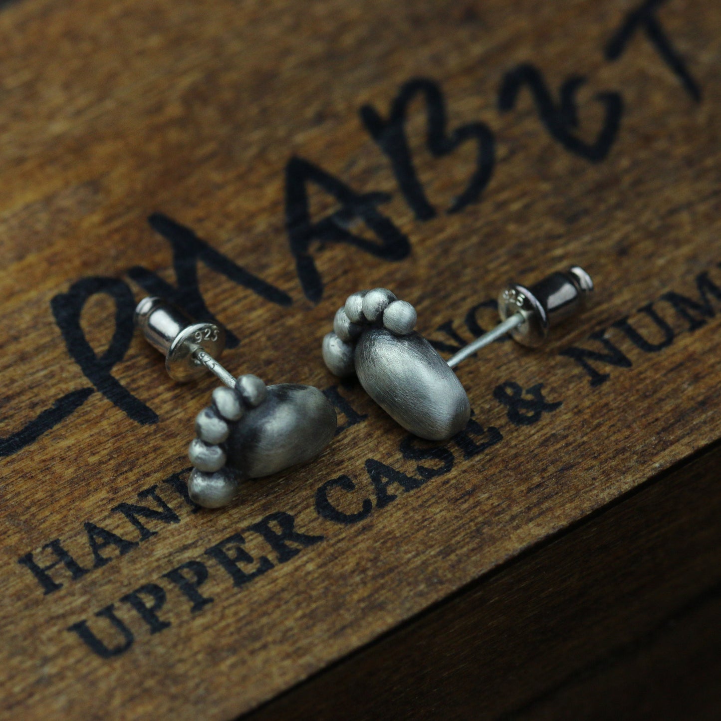 Baby feet sterling silver earrings