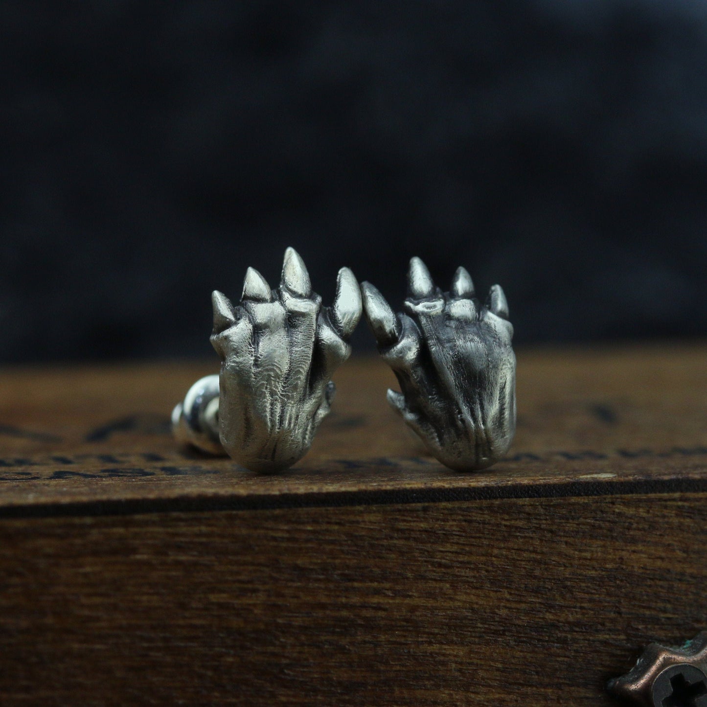 Saber-toothed tiger claw earrings