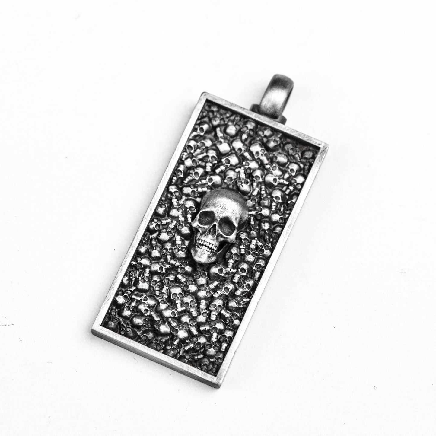 Intensive Skull Pendant, Tag Brass. Skull pendant in sterling silver. Knight Ornament, Thousand Faced Skull Pendant, Simple Silver